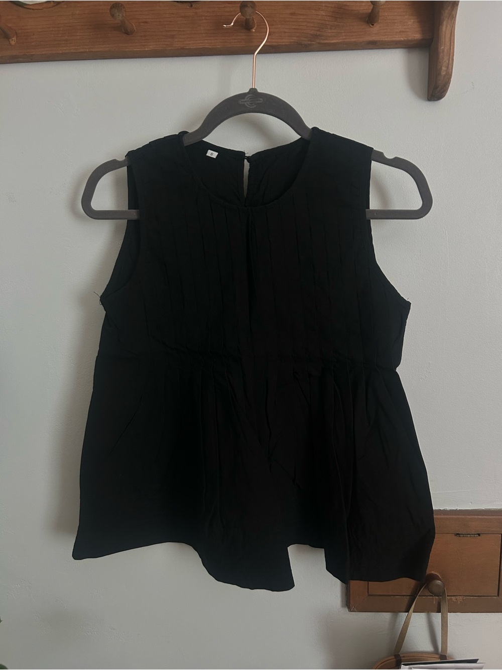 Women's Black Sleeveless Pleated Peplum Top